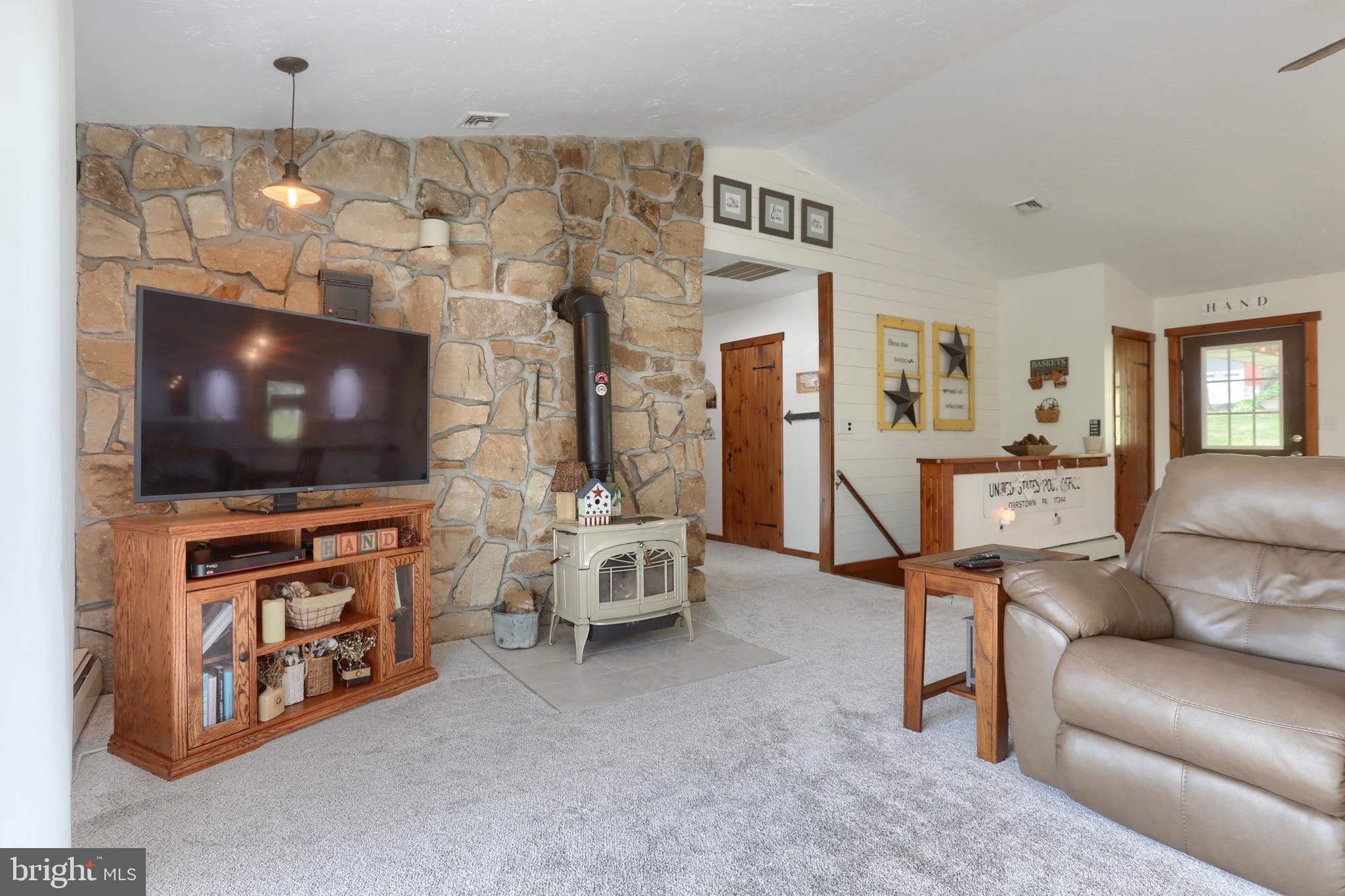 10 Bullfrog Road Grantville, PA 17028 - Photo 18 of 51 a living room with furniture and a flat screen tv