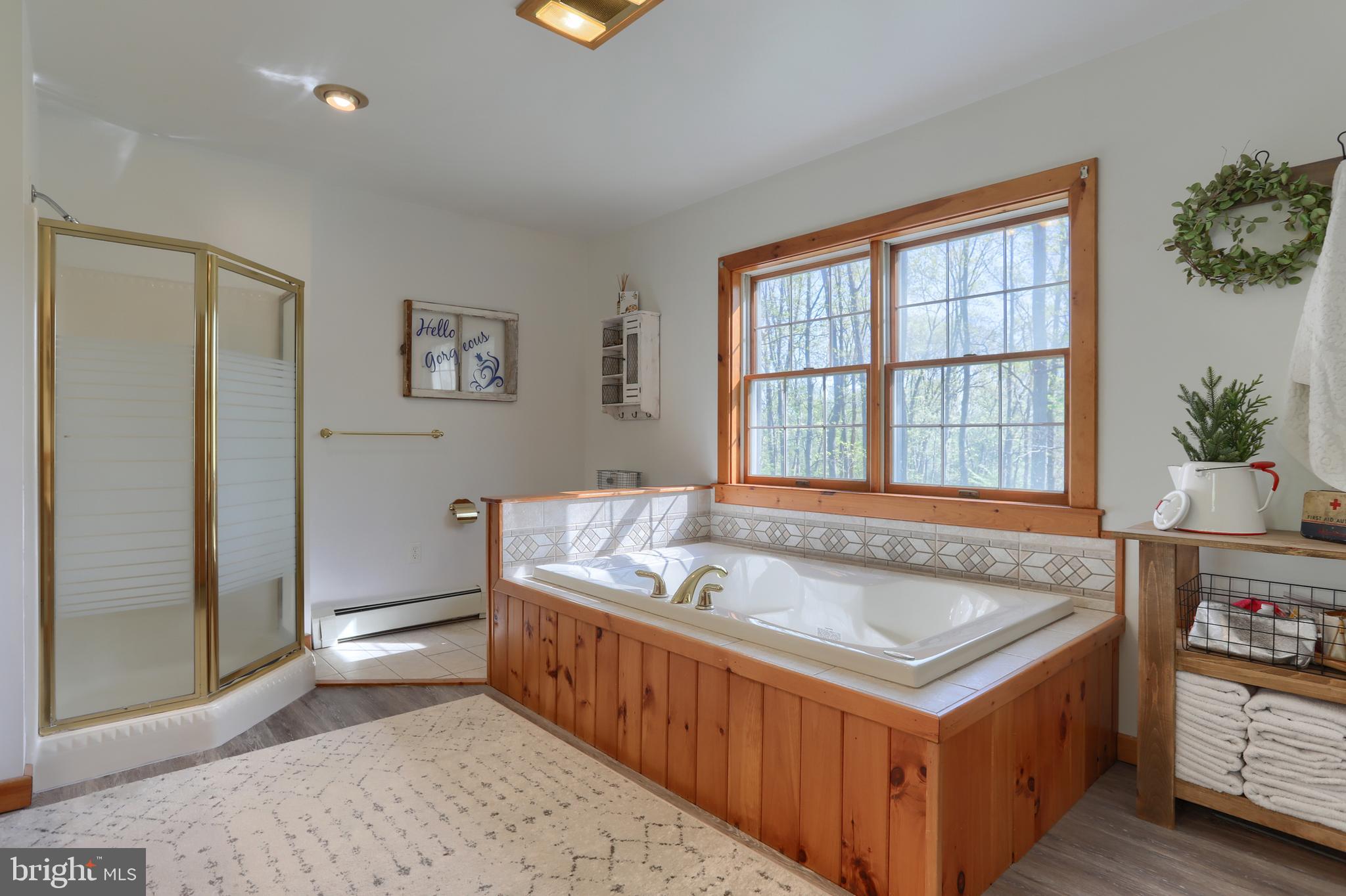 10 Bullfrog Road Grantville, PA 17028 - Photo 30 of 51 a spacious bedroom with a bed and a window