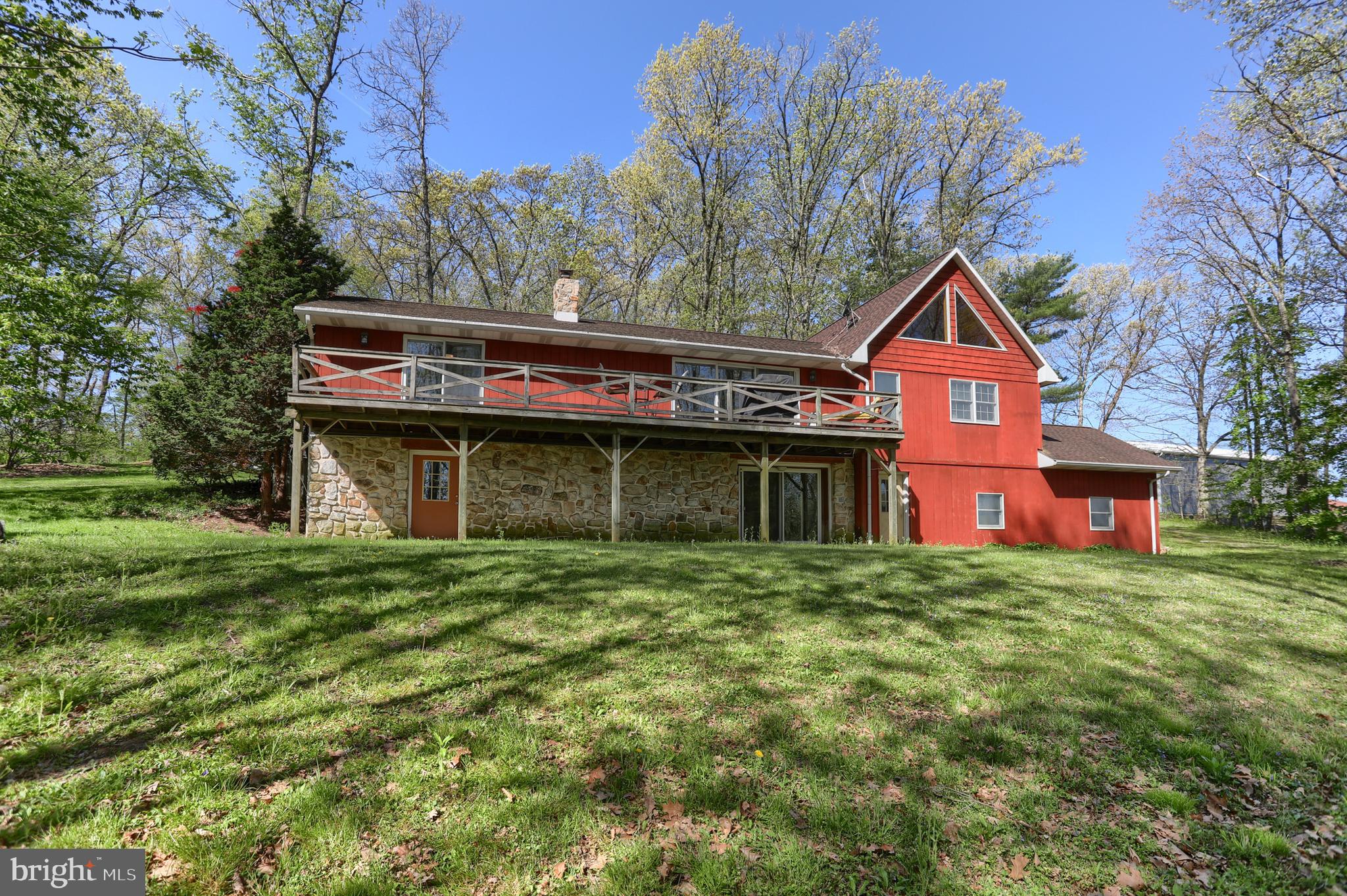 10 Bullfrog Road Grantville, PA 17028 - Photo 47 of 51 a front view of a house with a garden