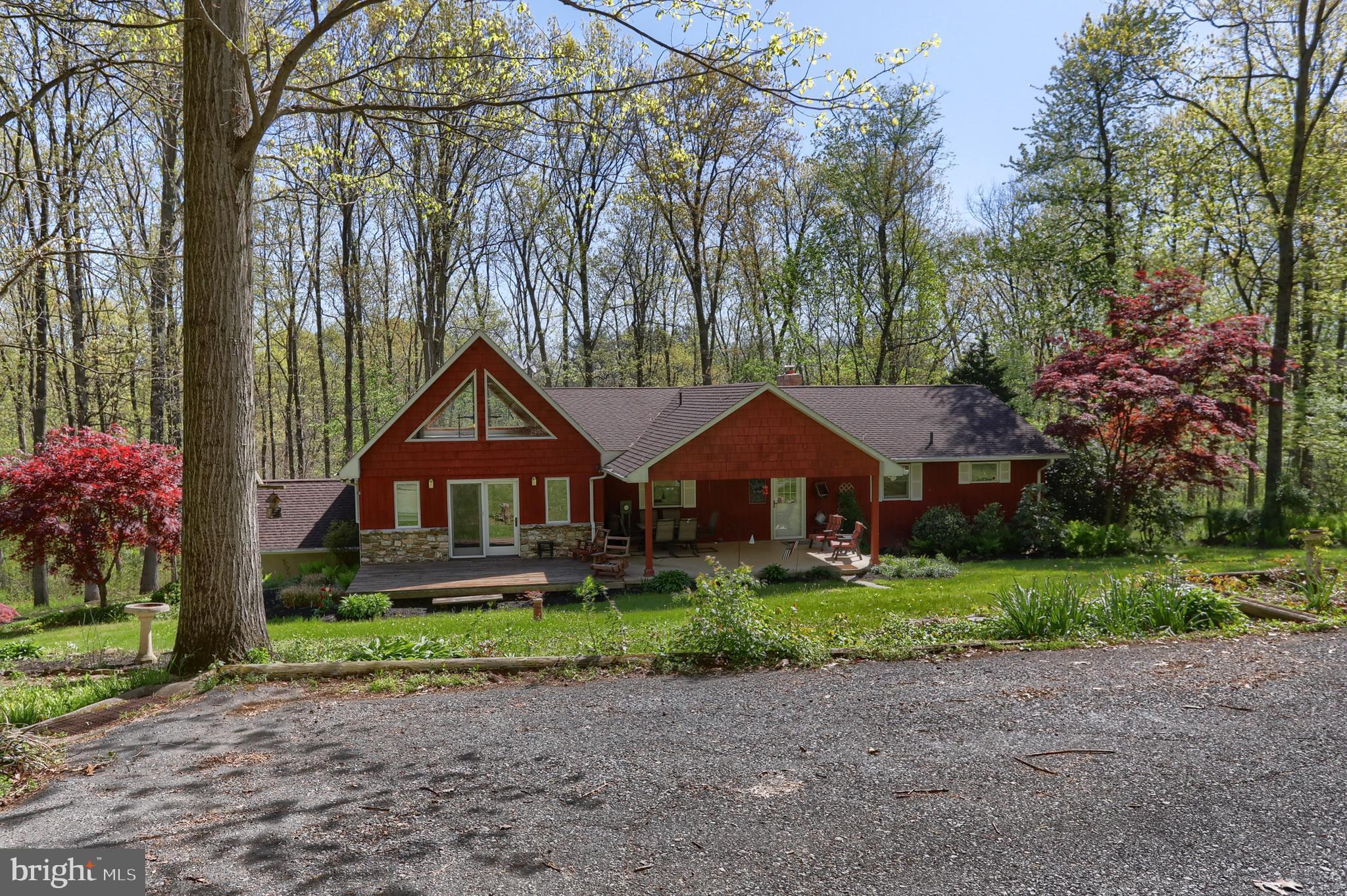 10 Bullfrog Road Grantville, PA 17028 - Photo 5 of 51 a front view of a house with garden