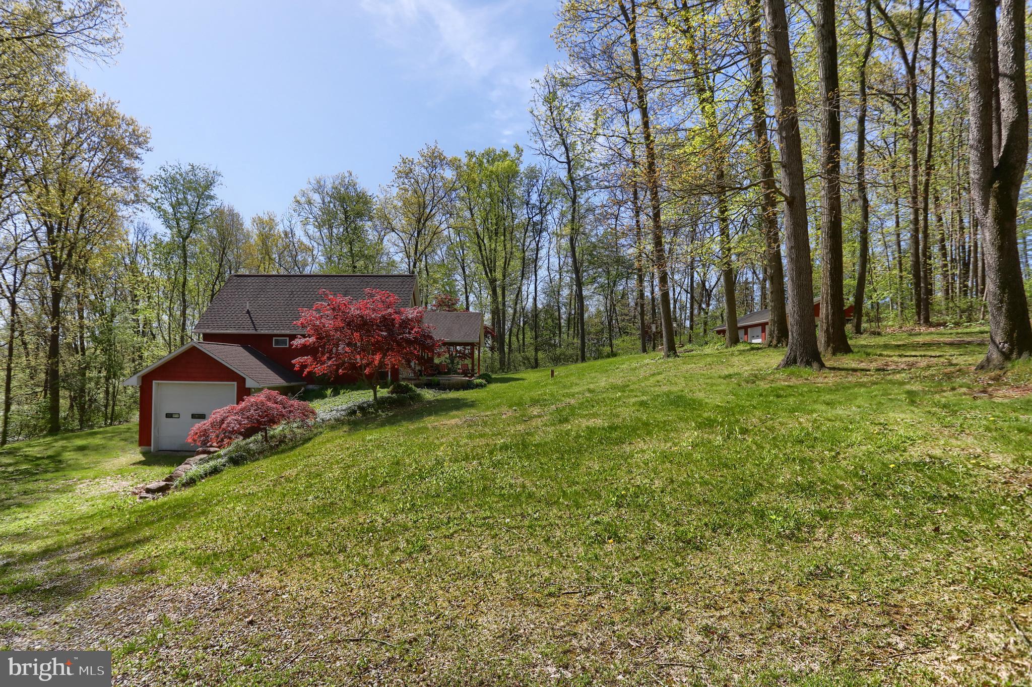 10 Bullfrog Road Grantville, PA 17028 - Photo 51 of 51 a backyard of a house with table and chairs