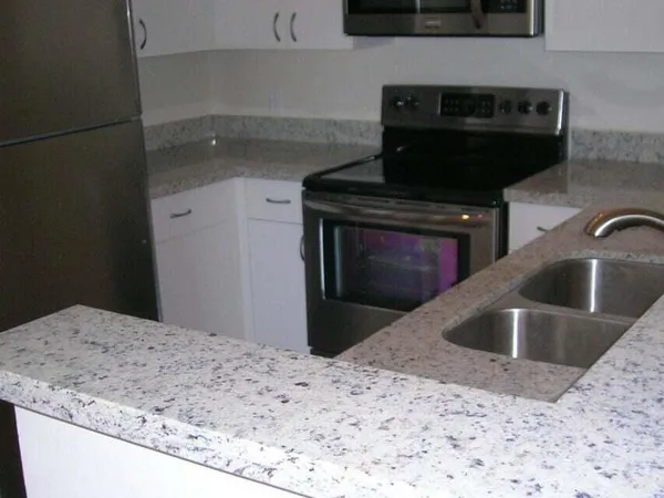 a kitchen with a stove and a sink