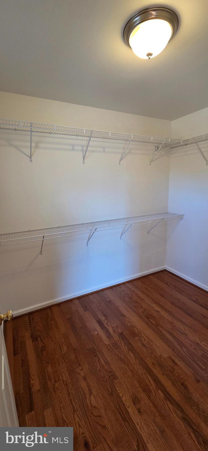 25366 Vacation Place Aldie, VA 20105 - Photo 25 of 51 a view of empty room with wooden floor