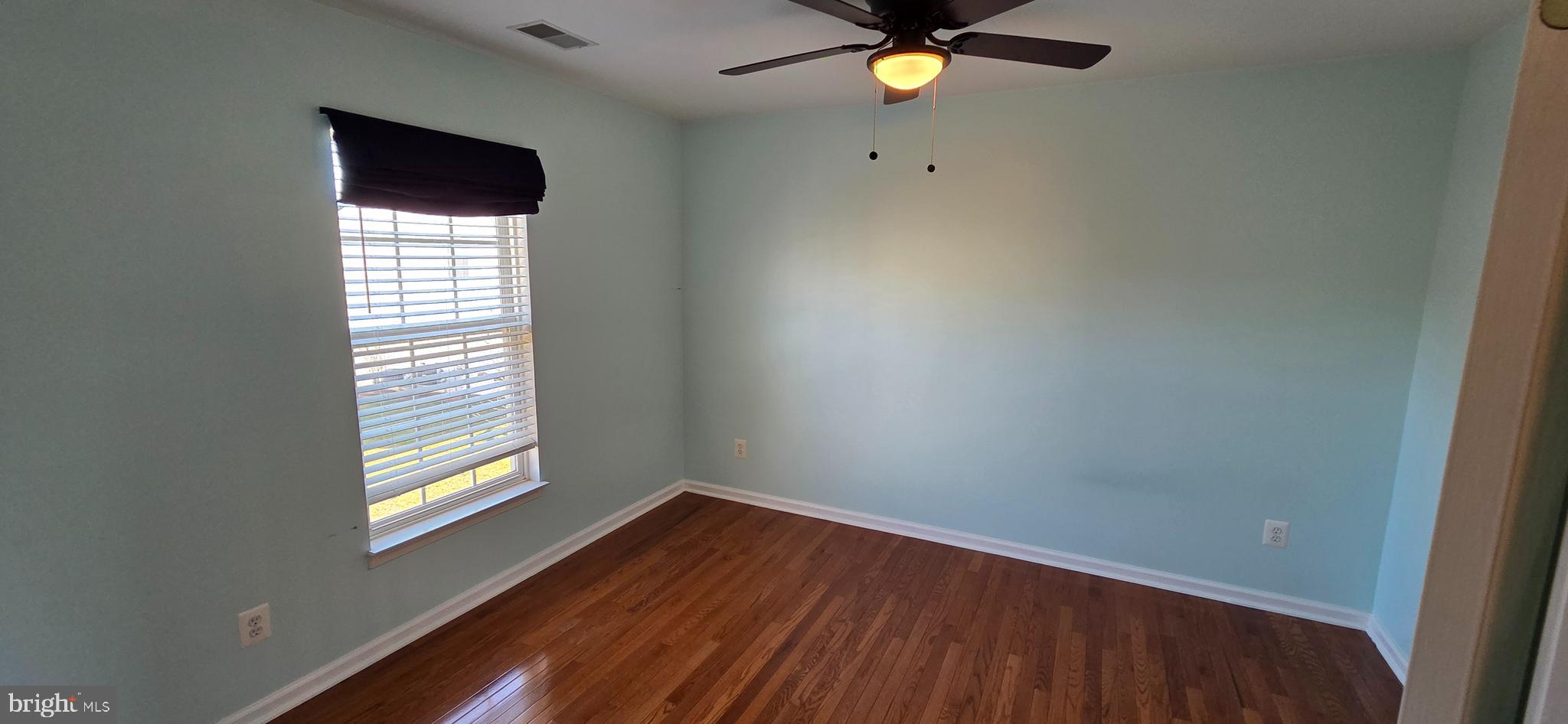 25366 Vacation Place Aldie, VA 20105 - Photo 28 of 51 an empty room with windows and fan