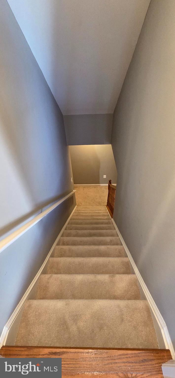 25366 Vacation Place Aldie, VA 20105 - Photo 34 of 51 a bedroom with a bed and wooden floor