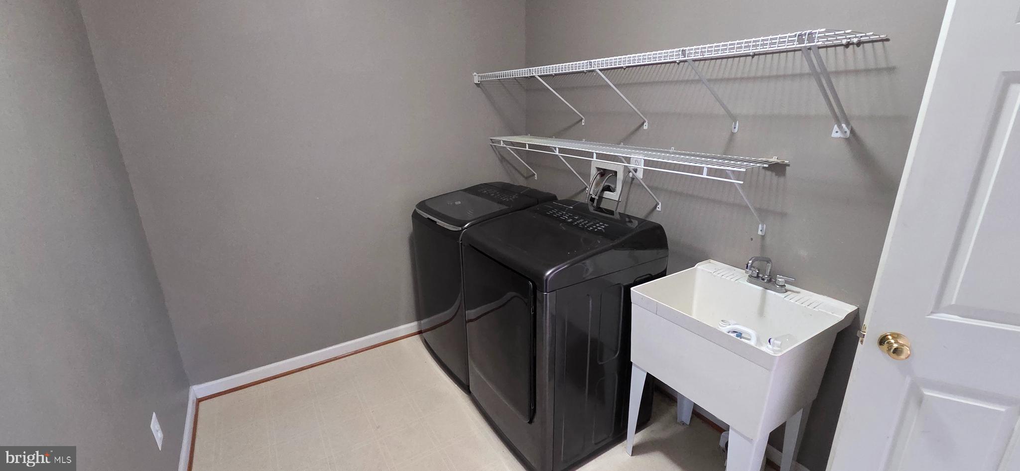25366 Vacation Place Aldie, VA 20105 - Photo 48 of 51 a utility room with dryer and washer