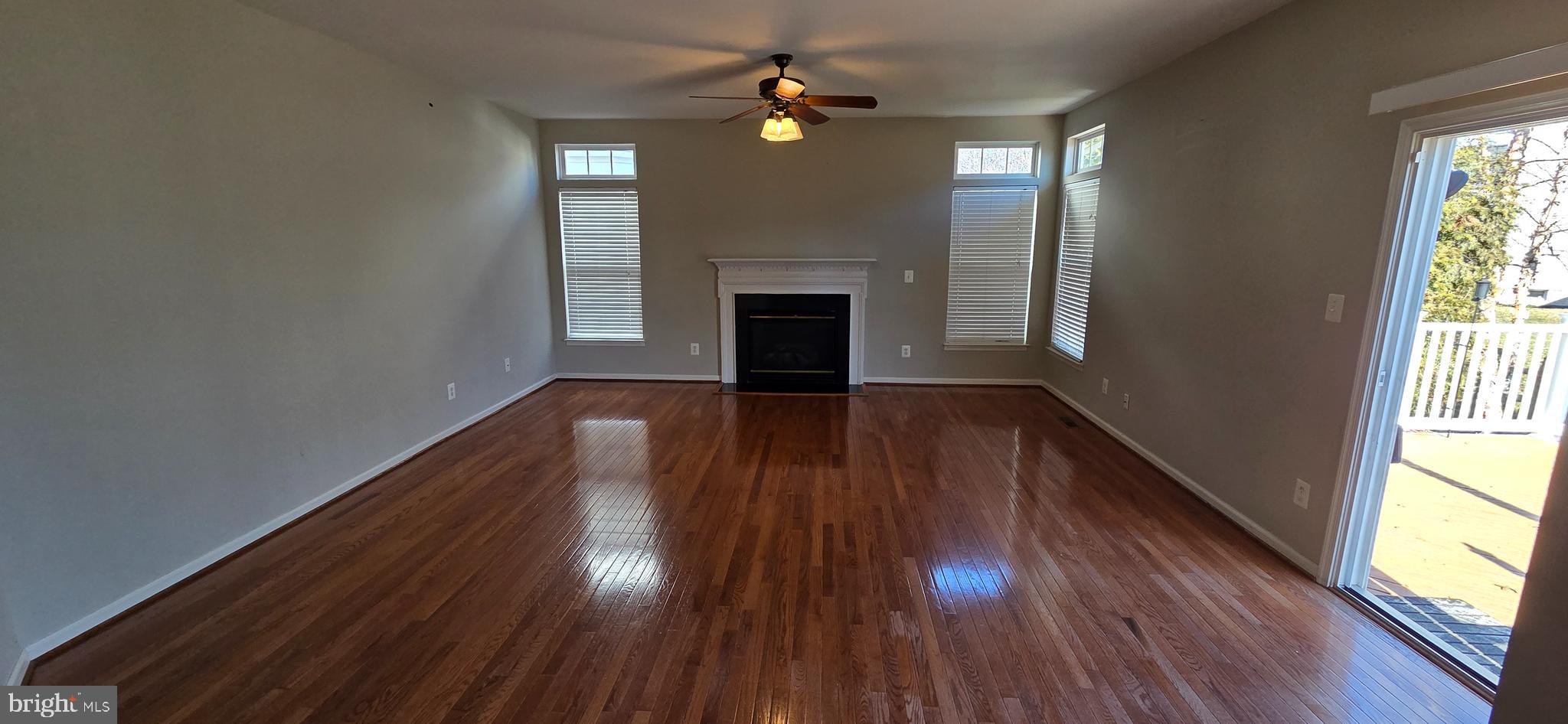 25366 Vacation Place Aldie, VA 20105 - Photo 7 of 51 wooden floor in an empty room with a window