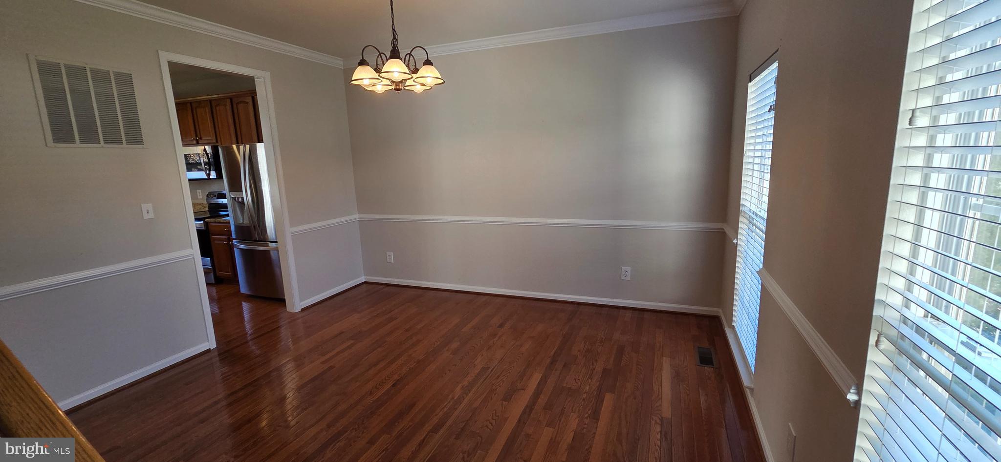 25366 Vacation Place Aldie, VA 20105 - Photo 9 of 51 wooden floor in an empty room with a window