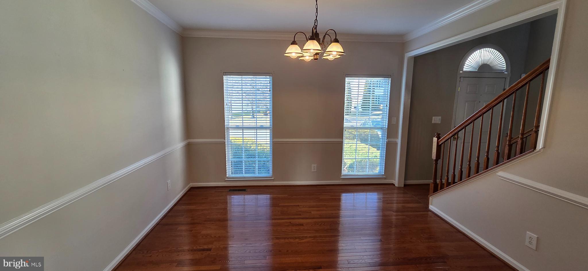 25366 Vacation Place Aldie, VA 20105 - Photo 10 of 51 a view of empty room with wooden floor and fan