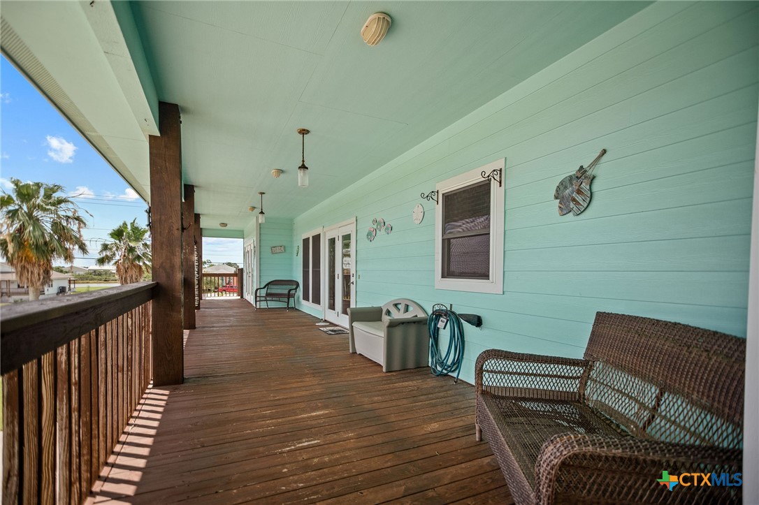 23 Macey Street Port O'Connor, TX 77982 - Photo 12 of 47 a view of a balcony with chairs