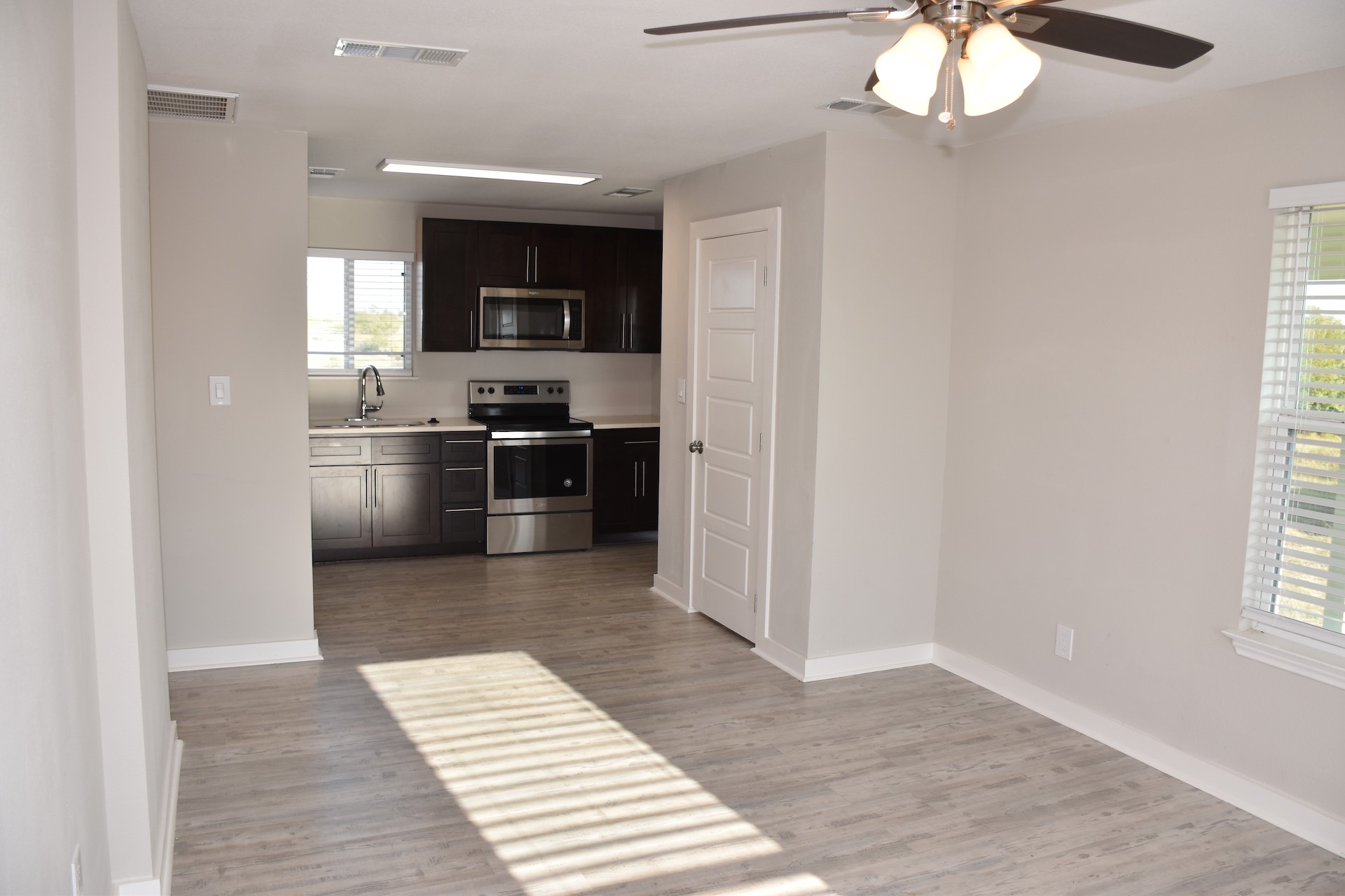3751 County Road 463 Elgin, TX 78621 - Photo 8 of 27 a kitchen with stainless steel appliances granite countertop a refrigerator and a sink