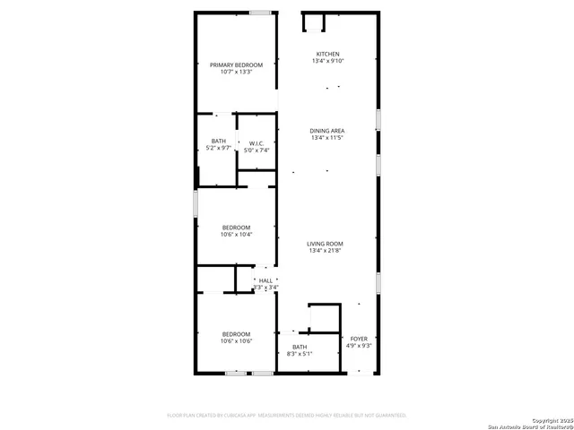 a picture of a bench in front of a wall