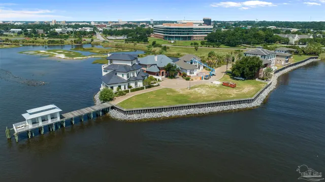 a view of a lake with a yard