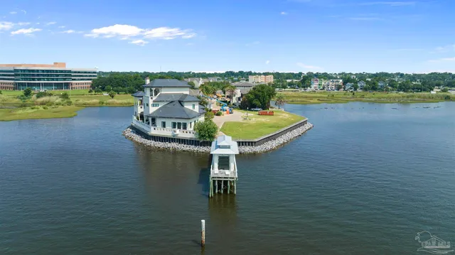 a view of a lake with a big yard