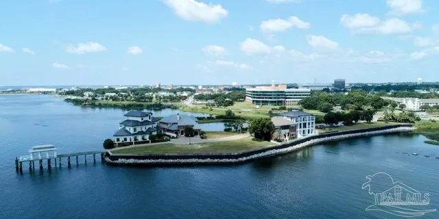 a view of a lake with a car parked
