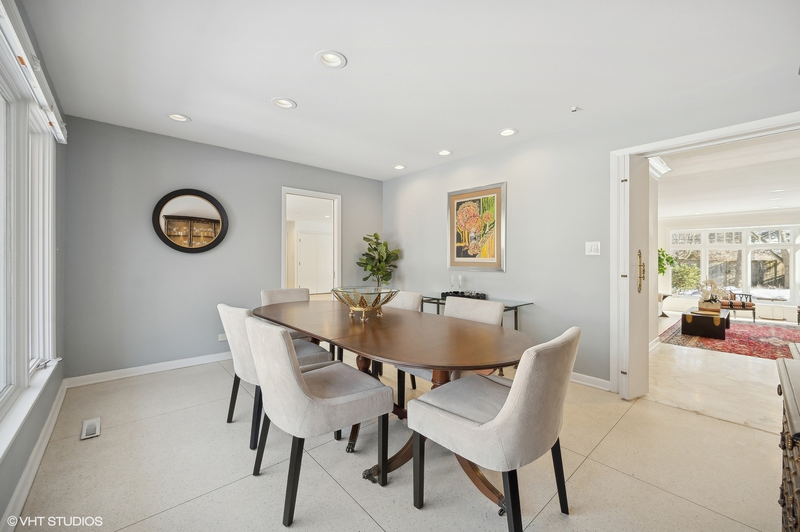 718 Chilton Lane Wilmette, IL 60091 - Photo 11 of 48 a view of a dining room with furniture and wooden floor