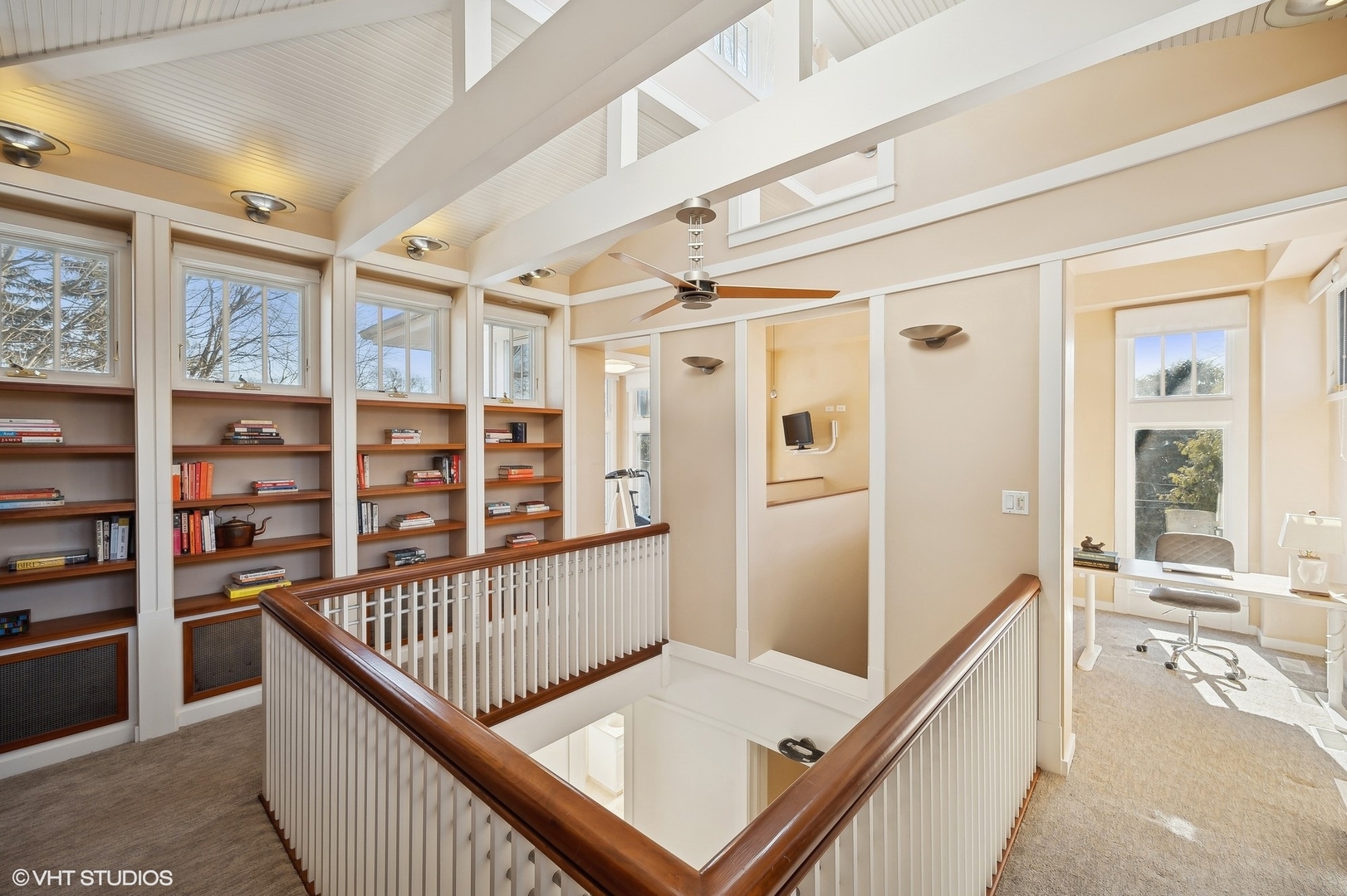 718 Chilton Lane Wilmette, IL 60091 - Photo 28 of 48 a view of a hallway with wooden floor and windows