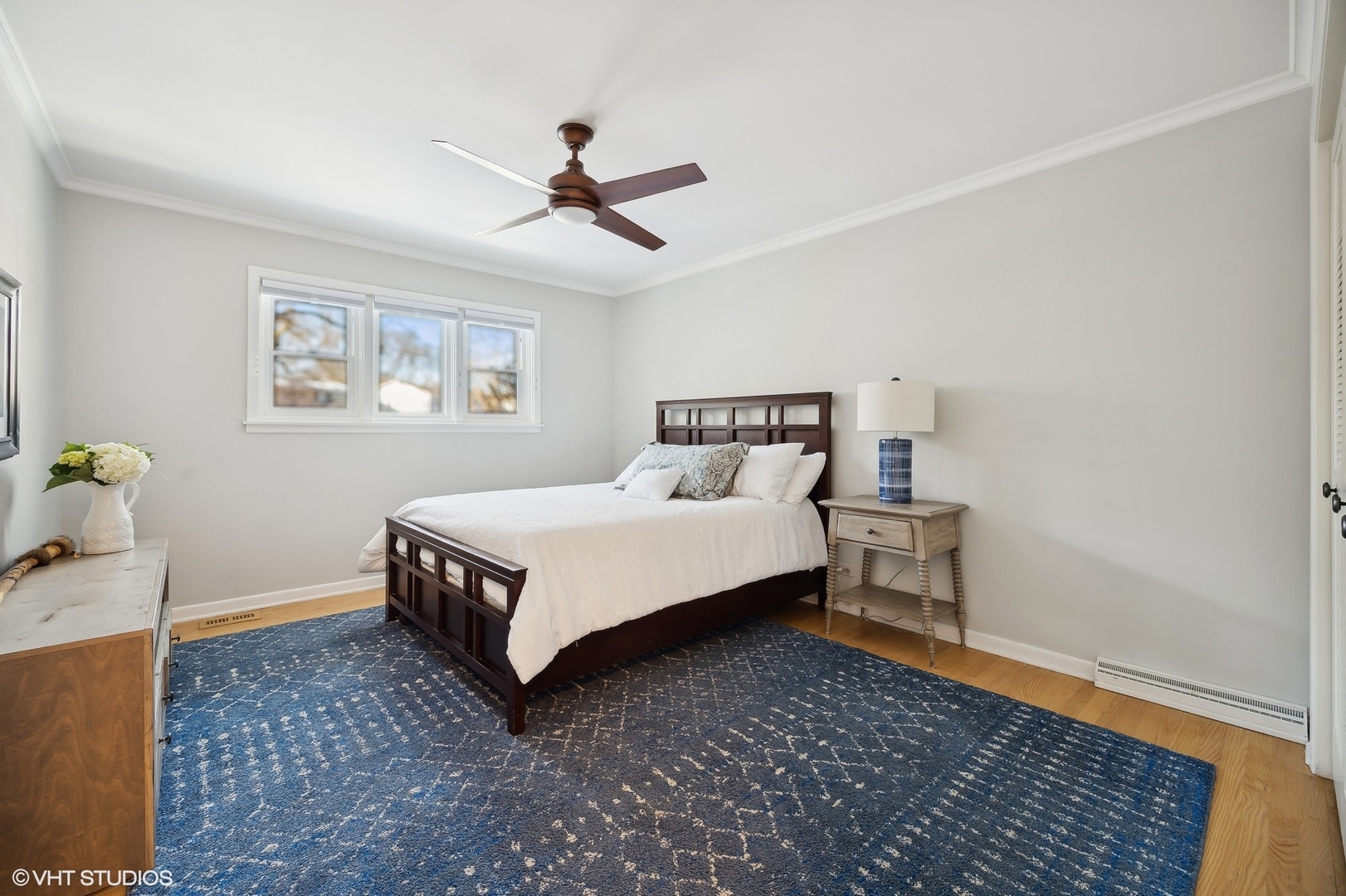 718 Chilton Lane Wilmette, IL 60091 - Photo 33 of 48 a bed sitting in a bedroom next to a window