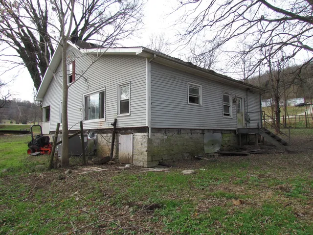 a view of a wooden fence and a window