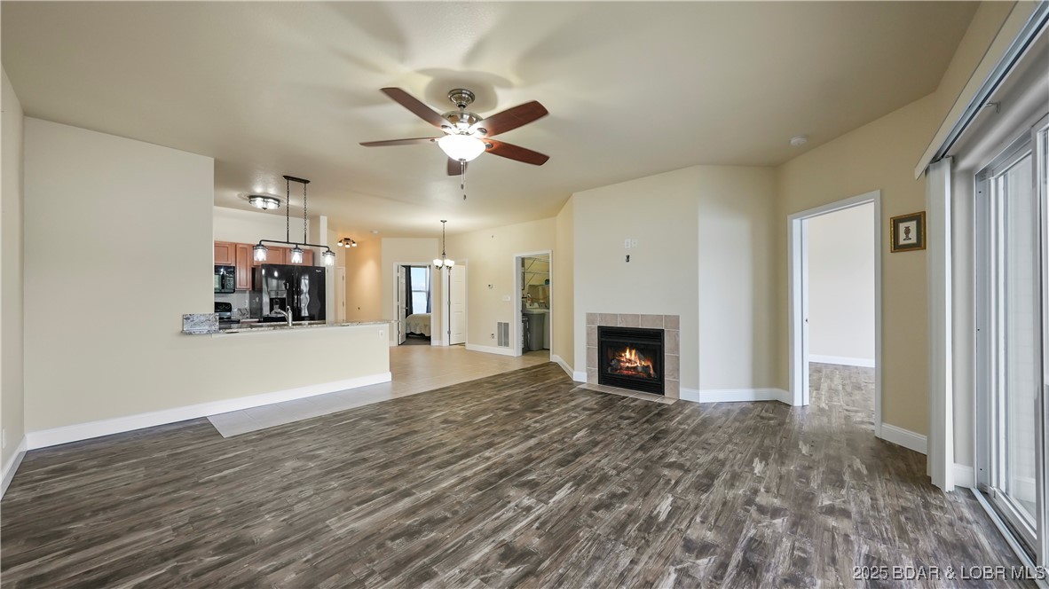 60 Knox Road, Unit Z204 Rocky Mount, MO 65072 - Photo 3 of 36 Electric fireplace warms the living area