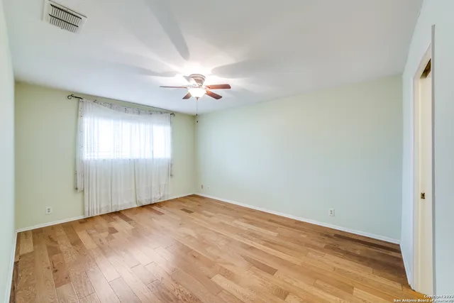 an empty room with windows