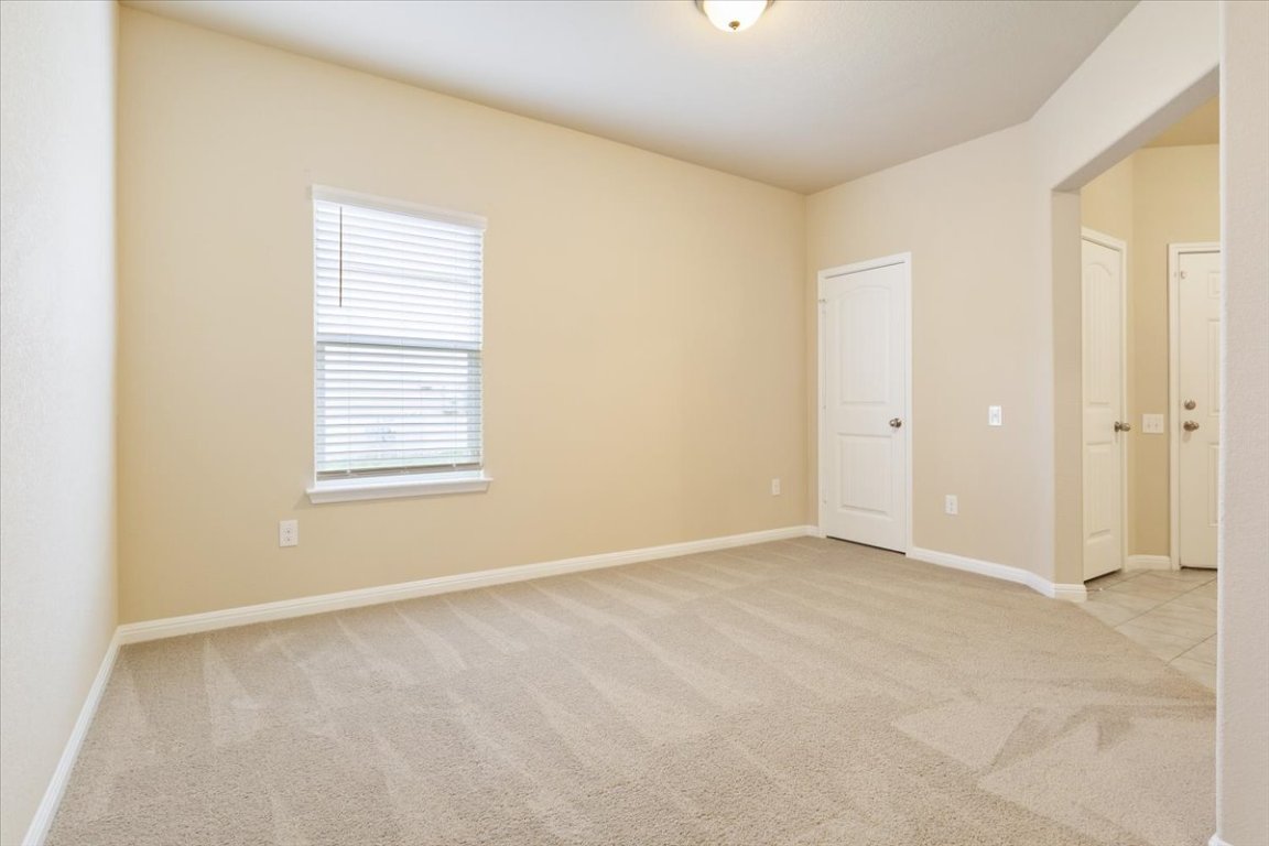 1504 Maier Drive Pflugerville, TX 78660 - Photo 16 of 31 an empty room with windows