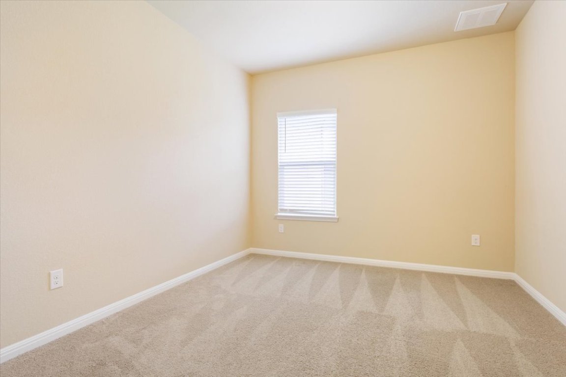 1504 Maier Drive Pflugerville, TX 78660 - Photo 17 of 31 a view of an empty room