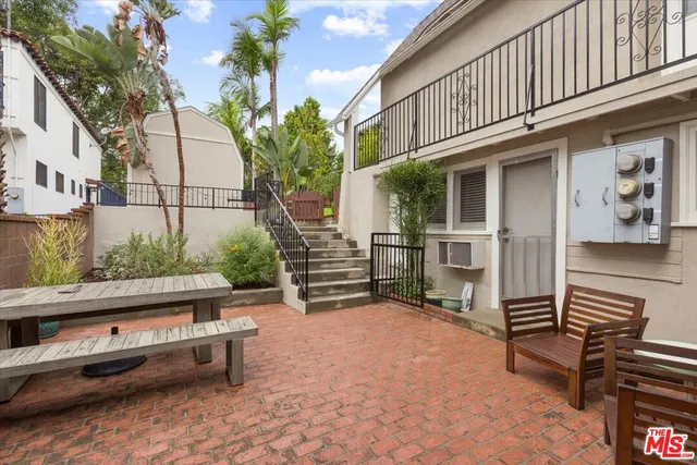 a view of outdoor seating area with furniture