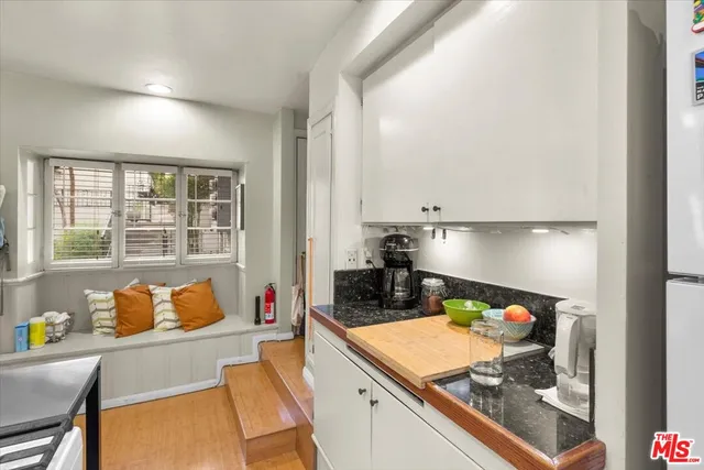 a kitchen with a large counter top space
