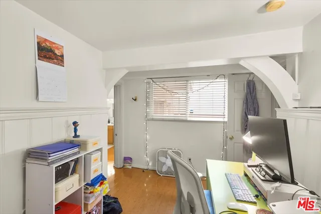 a room with furniture and a window