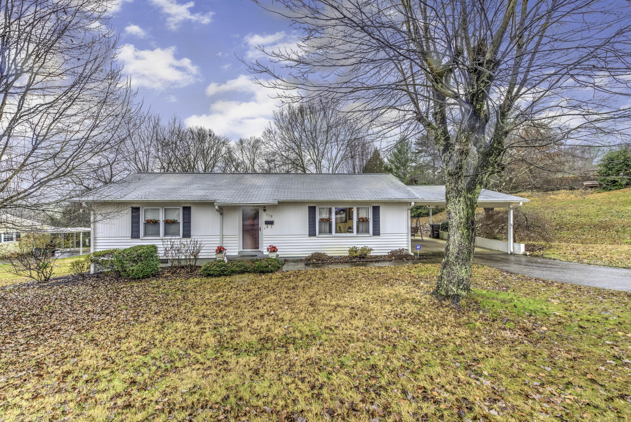 112 South Seneca Road Oak Ridge, TN 37830 - Photo 1 of 20 a front view of a house with a yard