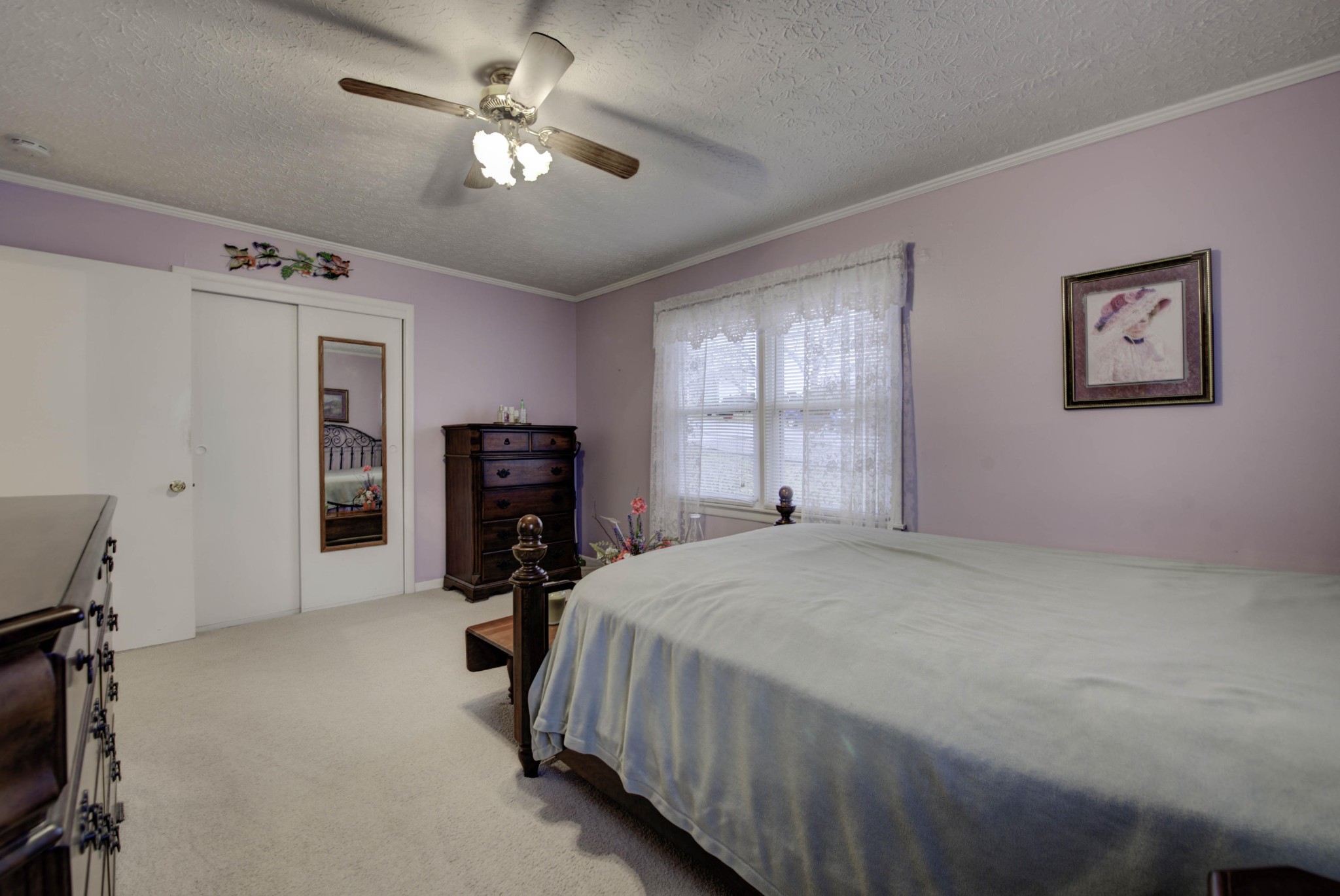112 South Seneca Road Oak Ridge, TN 37830 - Photo 11 of 20 a bed room with a bed and a tv