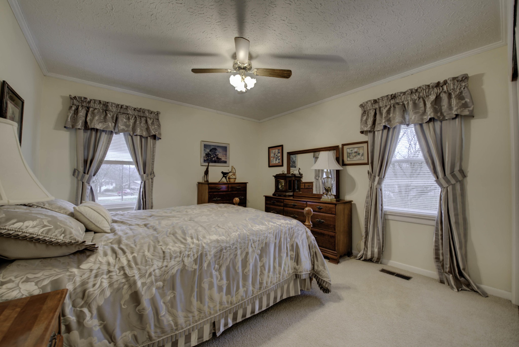 112 South Seneca Road Oak Ridge, TN 37830 - Photo 12 of 20 a bedroom with a bed and a walk in closet