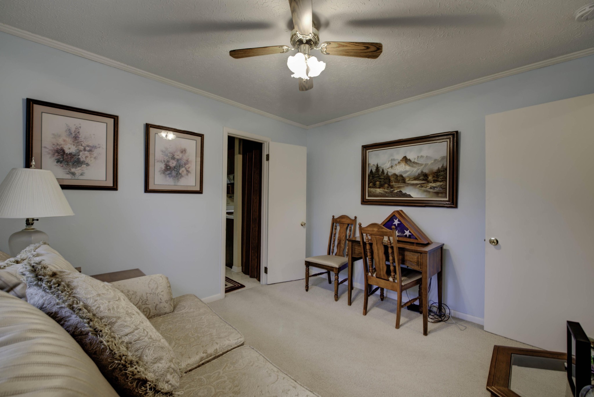 112 South Seneca Road Oak Ridge, TN 37830 - Photo 16 of 20 a bedroom with furniture and a chandelier