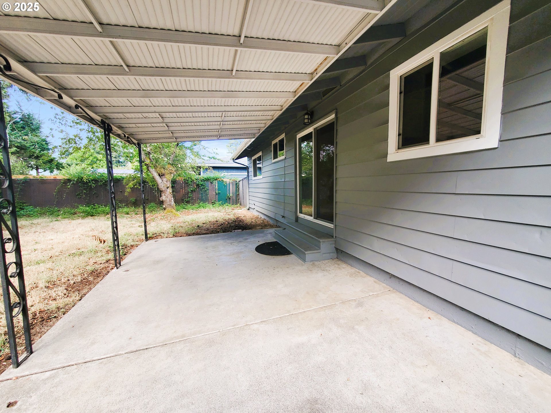 13050 Southeast Morrison Street Portland, OR 97233 - Photo 19 of 21 a view of a porch with furniture and a backyard
