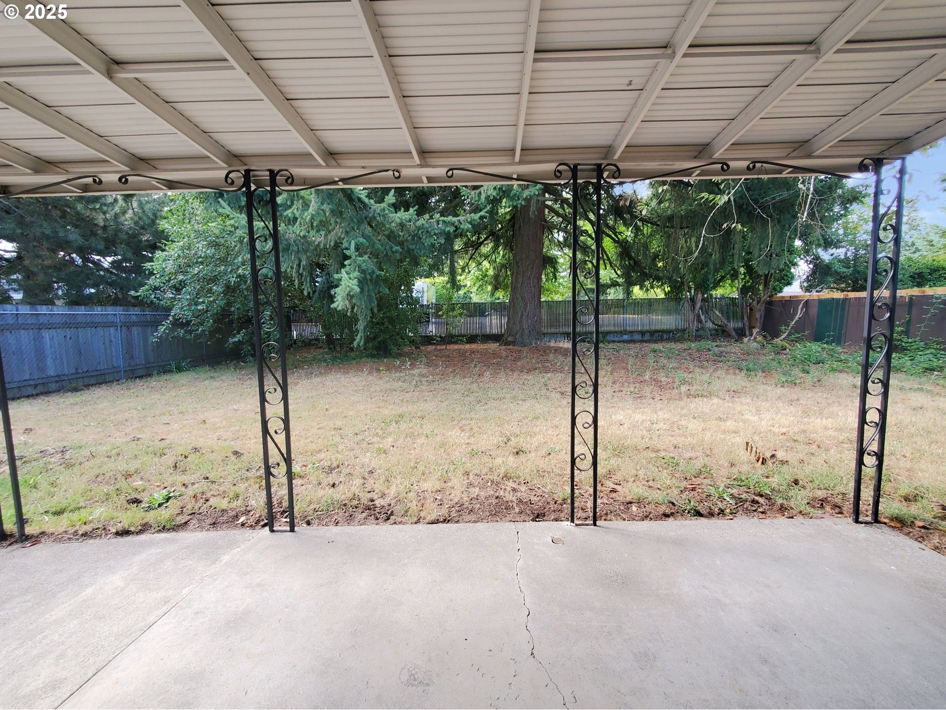 13050 Southeast Morrison Street Portland, OR 97233 - Photo 20 of 21 a backyard of a house with a tree and outdoor space