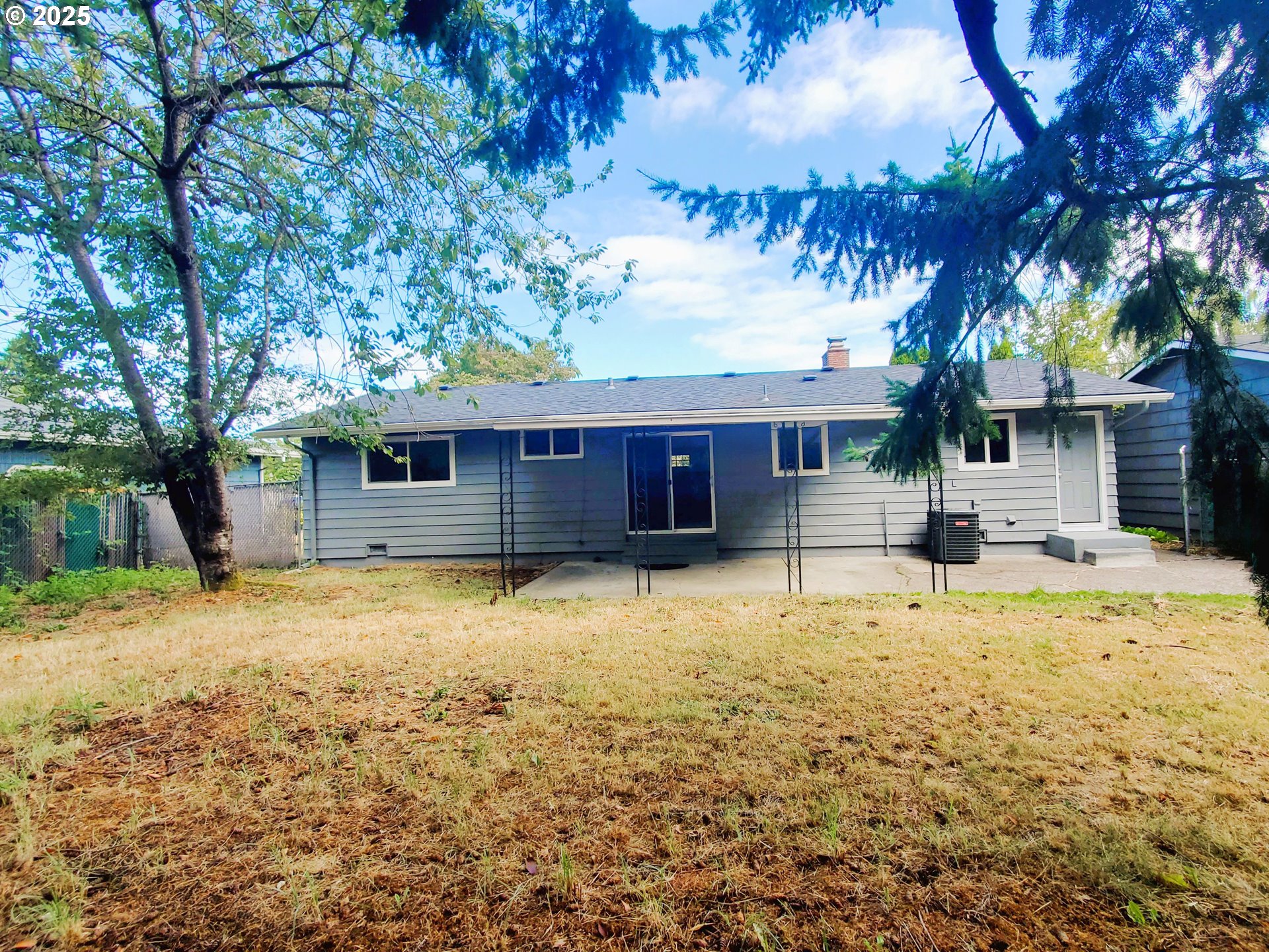 13050 Southeast Morrison Street Portland, OR 97233 - Photo 21 of 21 a house with swimming pool in front of it