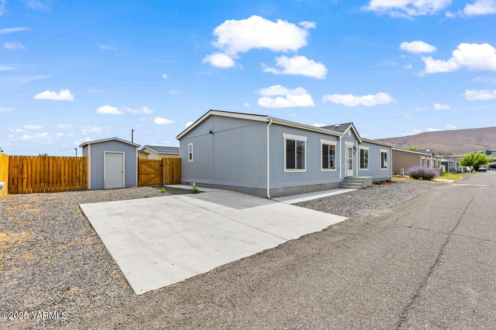 2802 South 5th Avenue, Unit 30 Union Gap, WA 98903 - Photo 3 of 23 a view of a house with entertaining space