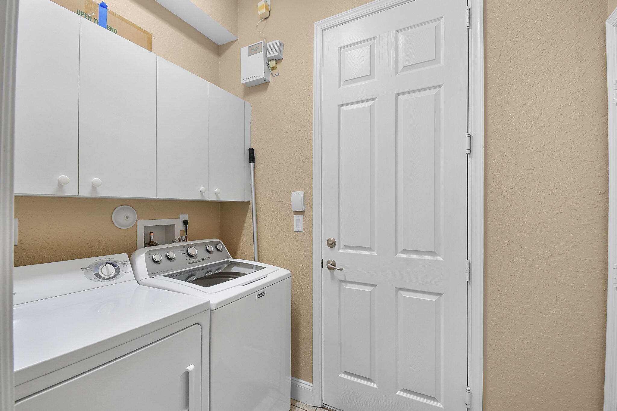 254 Southwest Walking Path Stuart, FL 34997 - Photo 15 of 31 a room with storage and utility