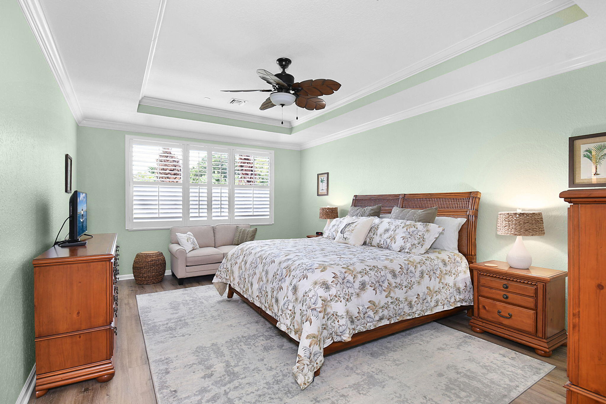 254 Southwest Walking Path Stuart, FL 34997 - Photo 22 of 31 a bedroom with a bed and furniture