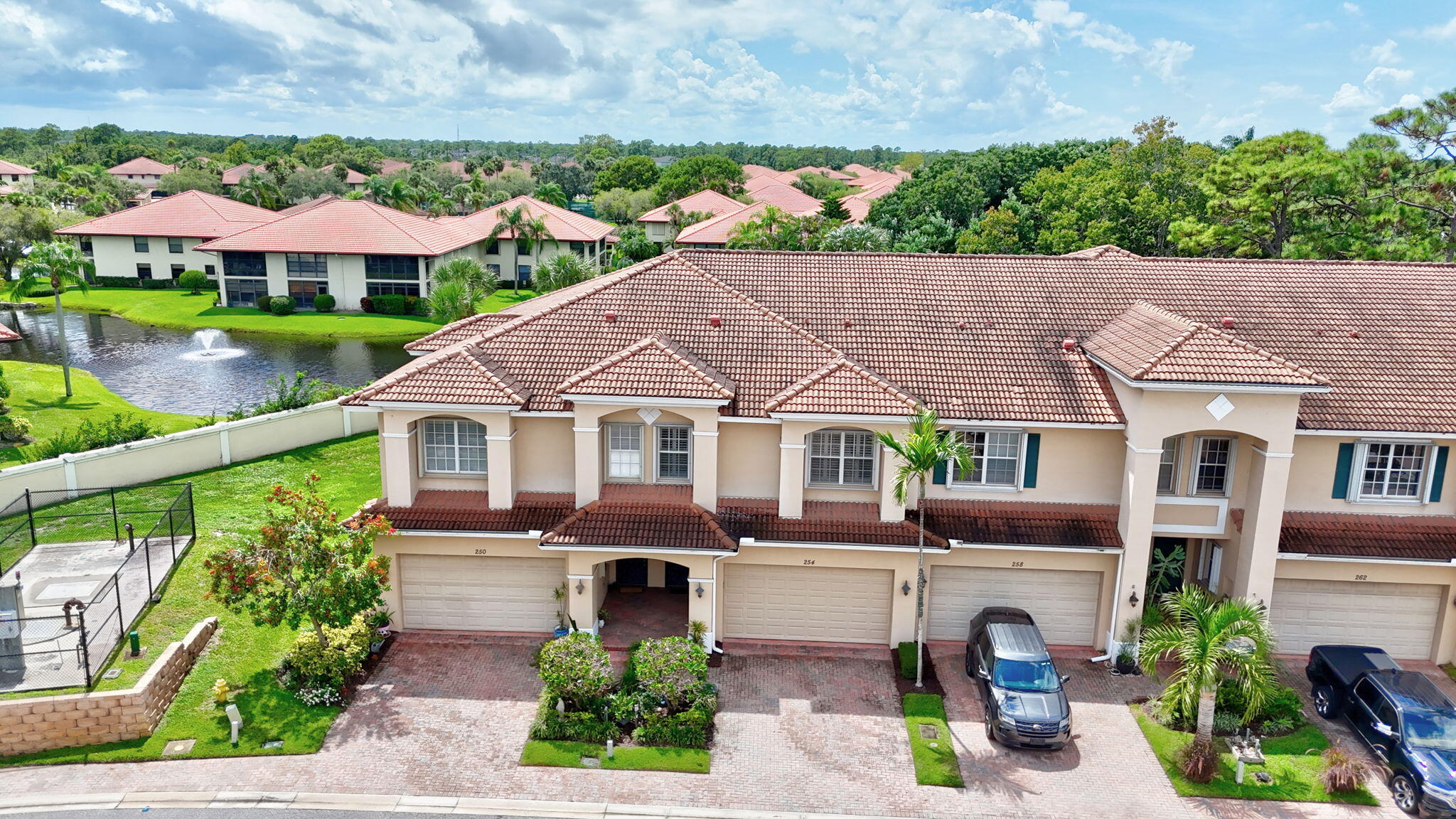 254 Southwest Walking Path Stuart, FL 34997 - Photo 30 of 31 a front view of a house with garden