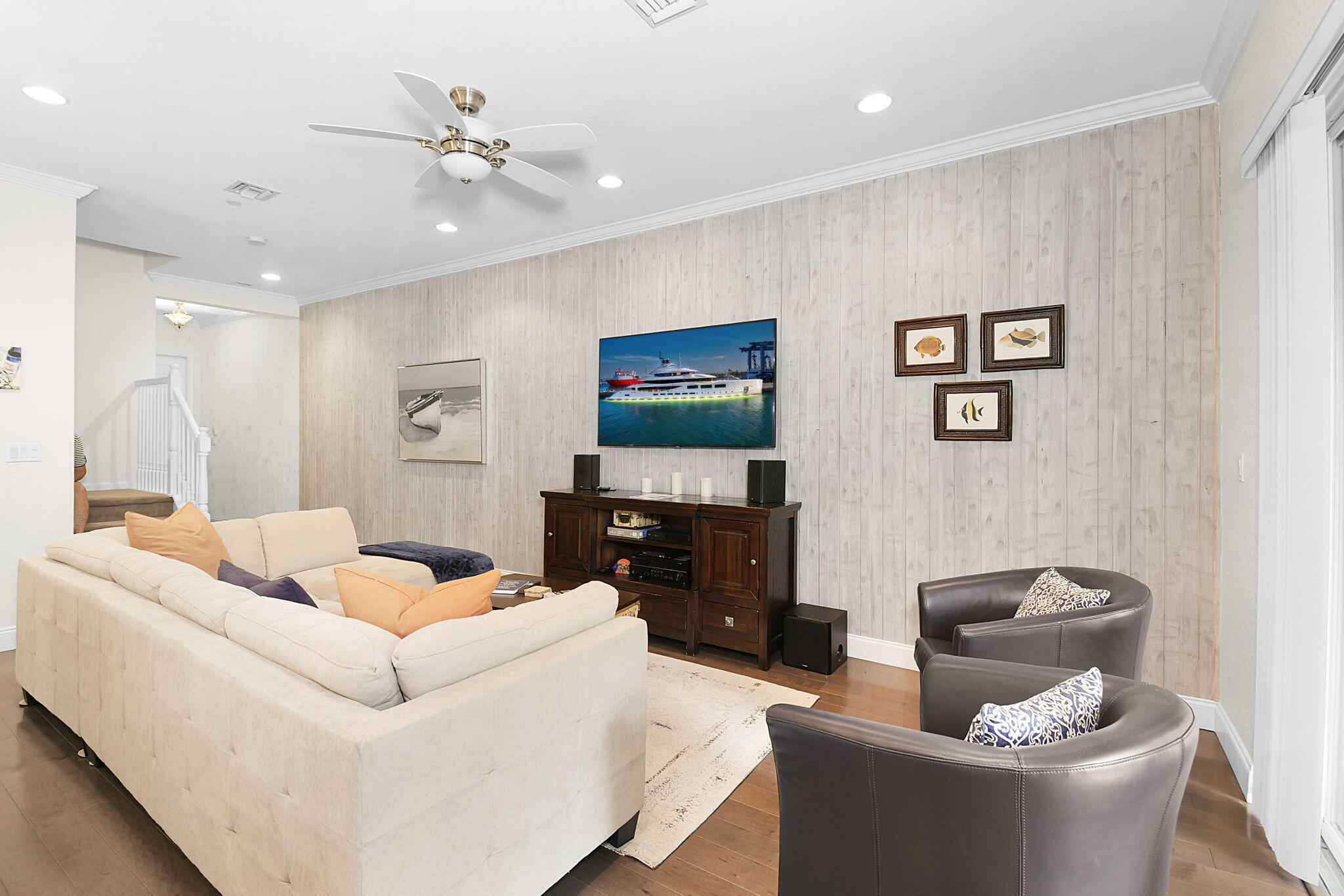 254 Southwest Walking Path Stuart, FL 34997 - Photo 3 of 31 a living room with furniture and a flat screen tv