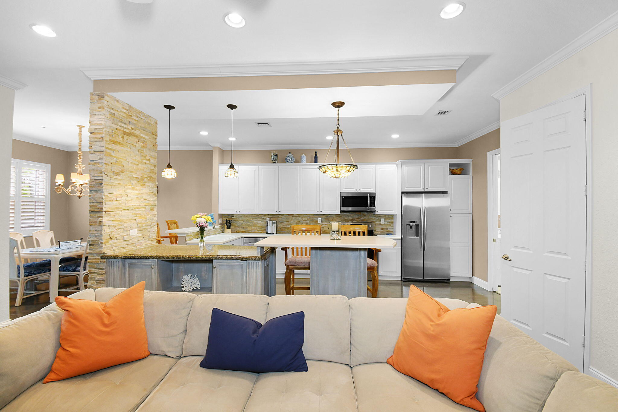 254 Southwest Walking Path Stuart, FL 34997 - Photo 5 of 31 a large kitchen with a table and chairs