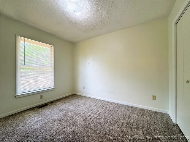 a view of a house with a large window