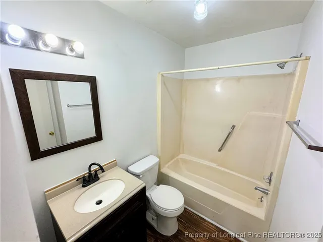 an empty room with a empty space and windows