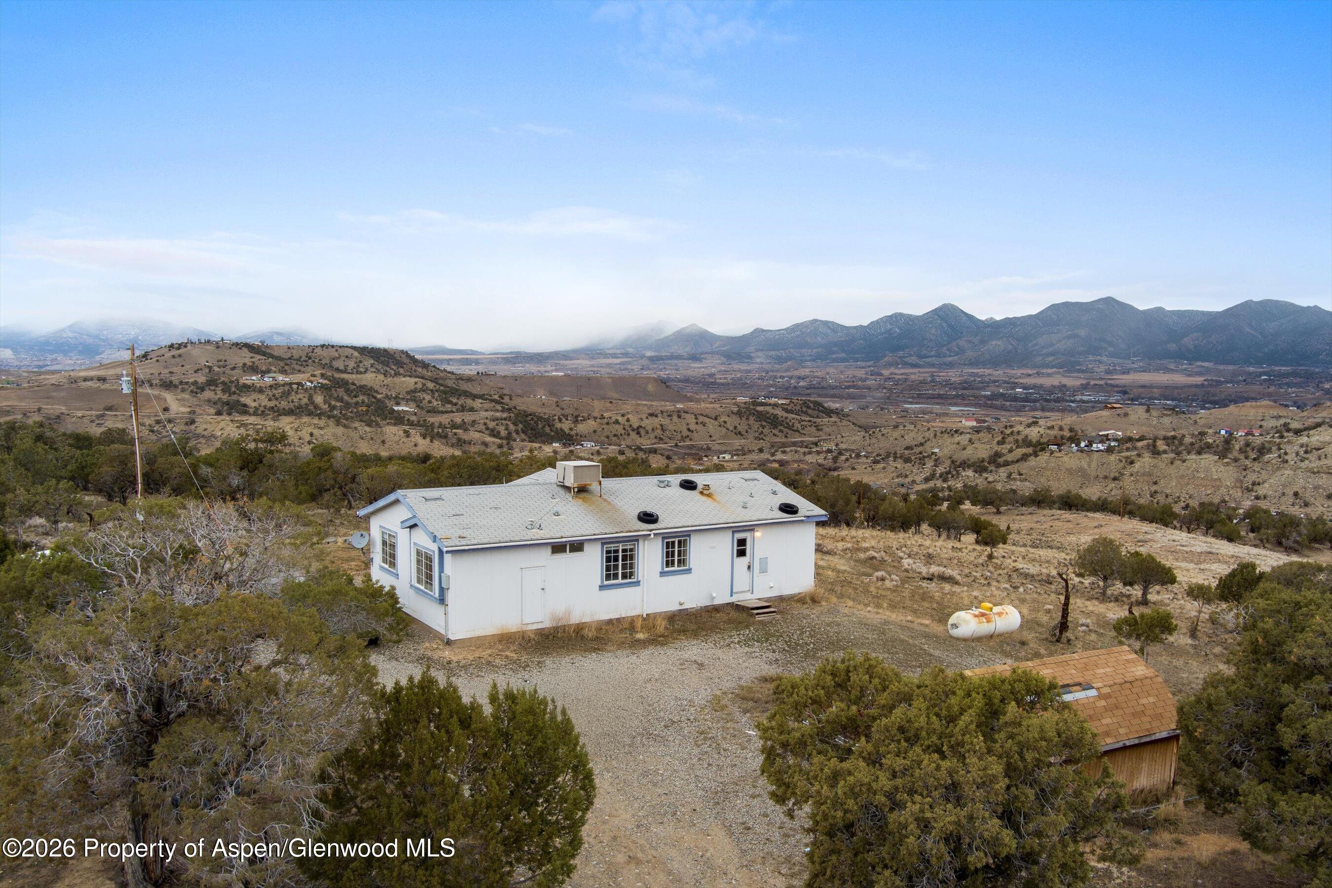 378 Alta Mesa Road Silt, CO 81652 - Photo 1 of 20 a view of a city with mountain