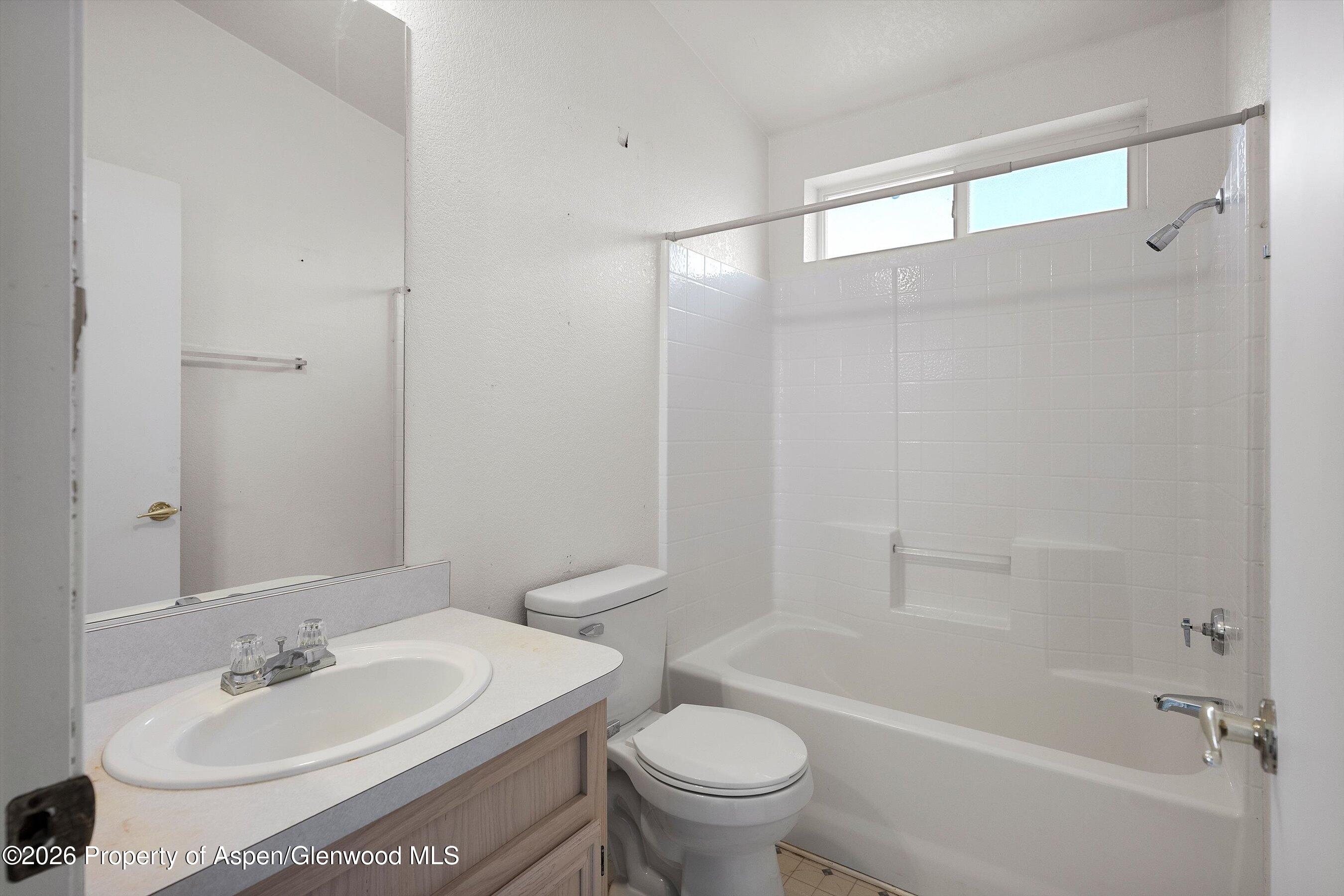 378 Alta Mesa Road Silt, CO 81652 - Photo 18 of 20 a bathroom with a sink toilet and shower