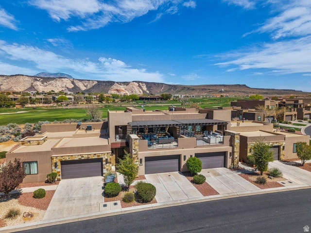 5010 Escapes Drive St. George, UT 84770 - Photo 2 of 46 Aerial perspective of suburban area with a mountainous background