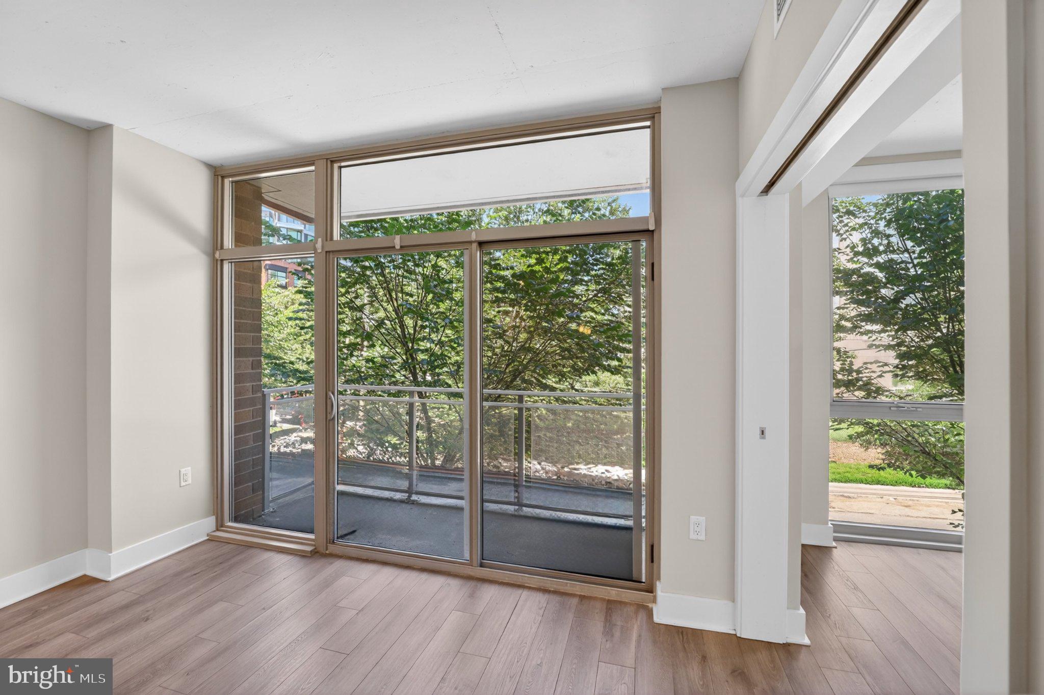 88 V Street Southwest, Unit 213 Washington, DC 20024 - Photo 16 of 26 Bright, airy space with nature views.