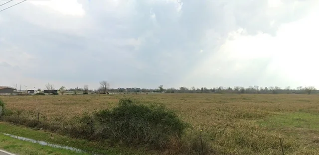 a view of a lake with a large bridge